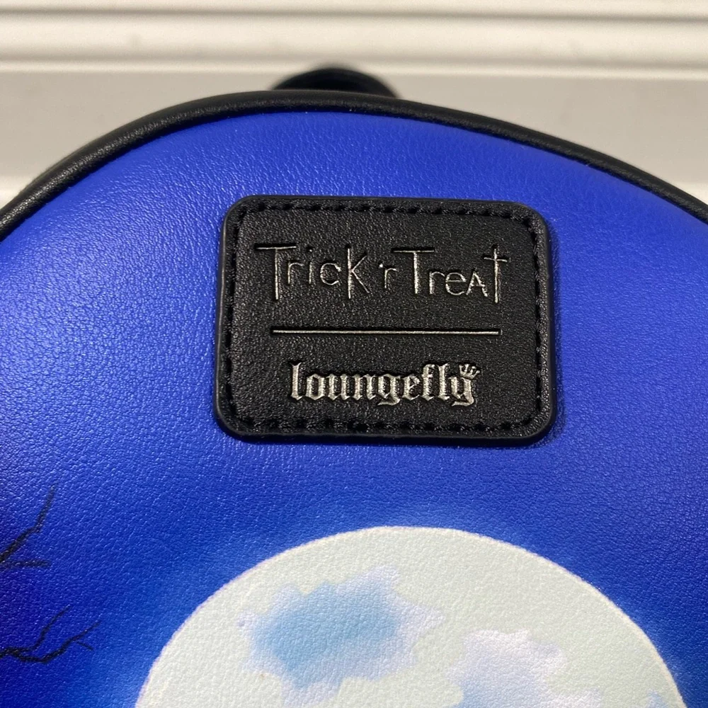 NEW | LOUNGEFLY Trick 'R Treat Glow-In-The-Dark Sam Mini Backpack